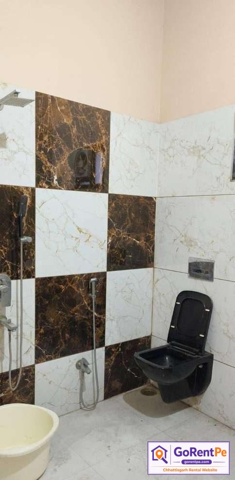 Fully furnished room for rent in Basant Vihar Gondwara Raipur with balcony, bed, wardrobe and rooftop access