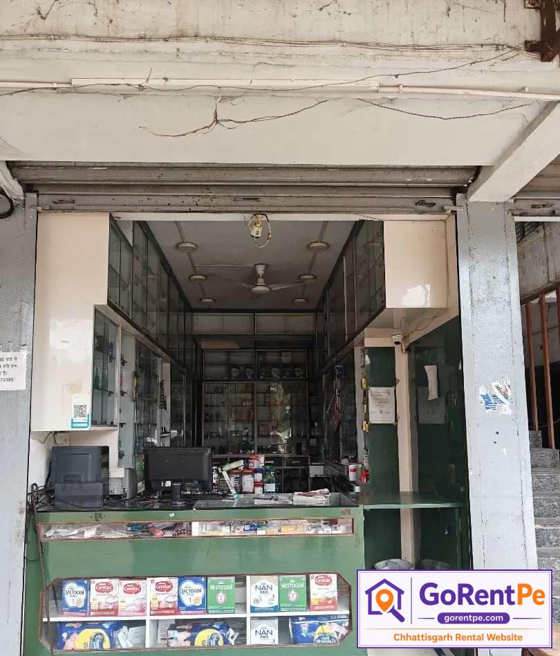 Fully furnished medical store for rent with display racks, billing counter, storage cabinets and prime commercial location